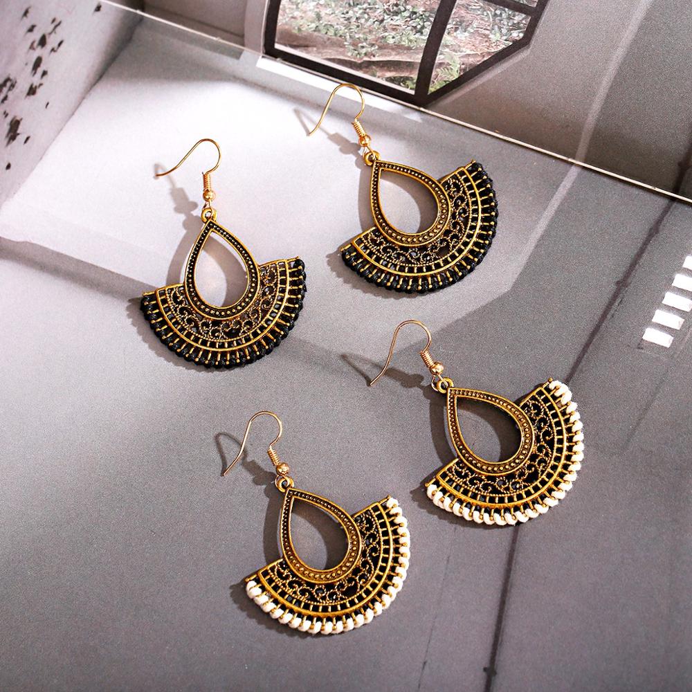 Kolczyki-Boucles d'Oreilles po - Women Accessories India avis et prix